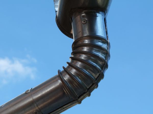 Metal Downspout Installation in Monument