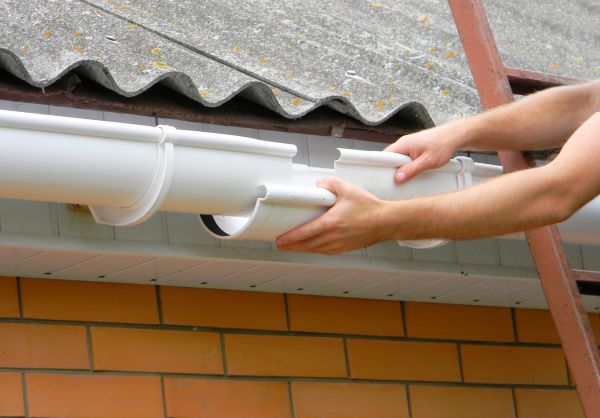 Cost of Gutter Hanging in Monument